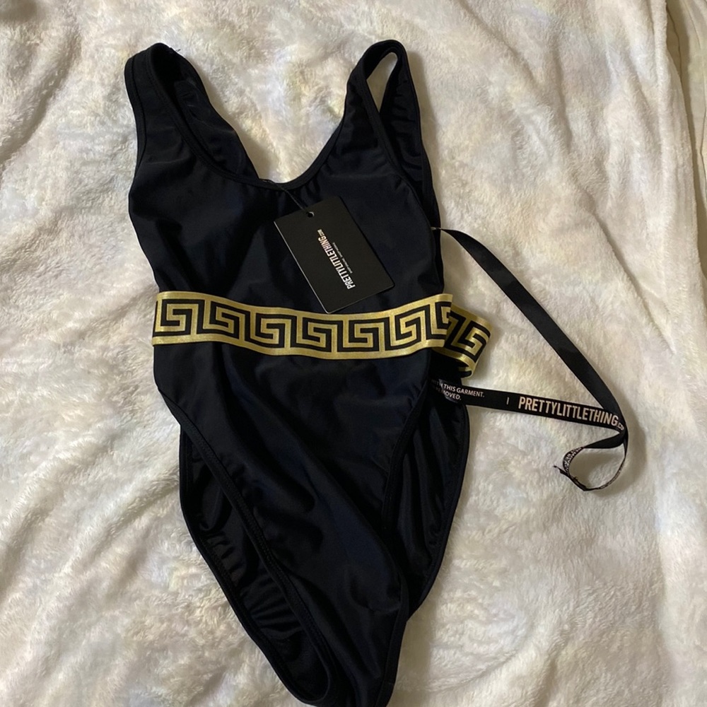 Black and gold bathing suit